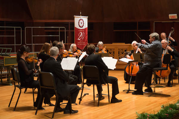 faculty on stage playing music