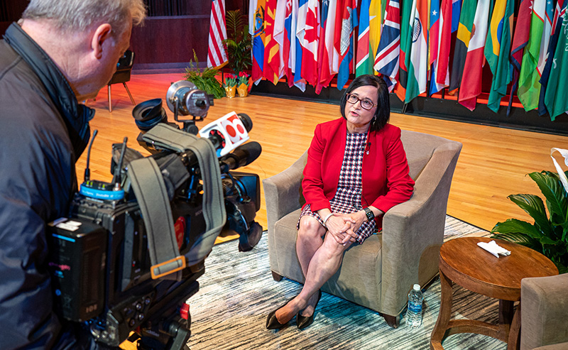 Dr. Singh talking in front of a WISH-TV camera