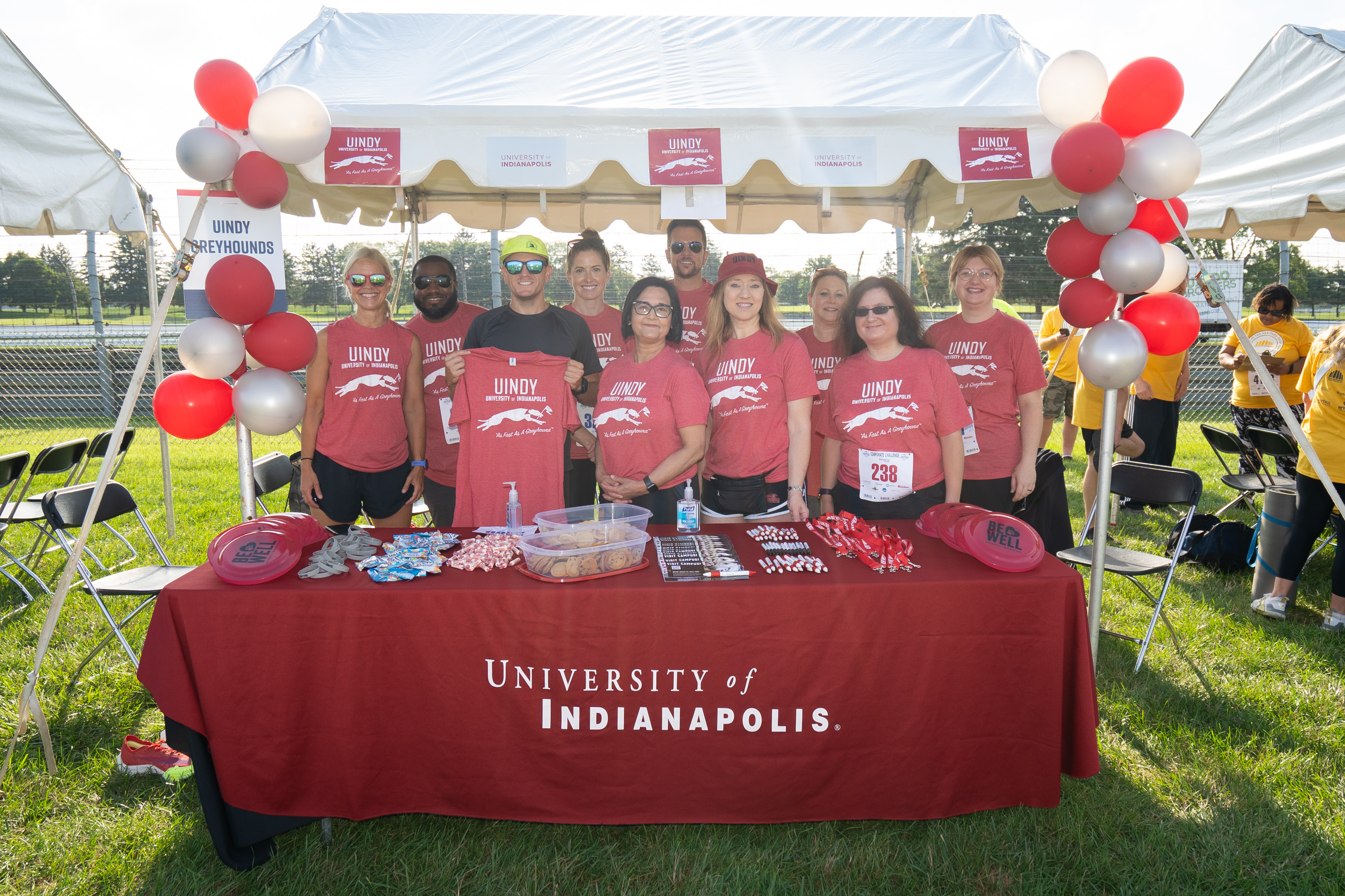 group shot at the UIndy booth