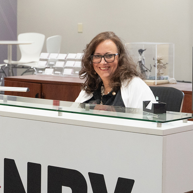 lady sitting behind the front desk