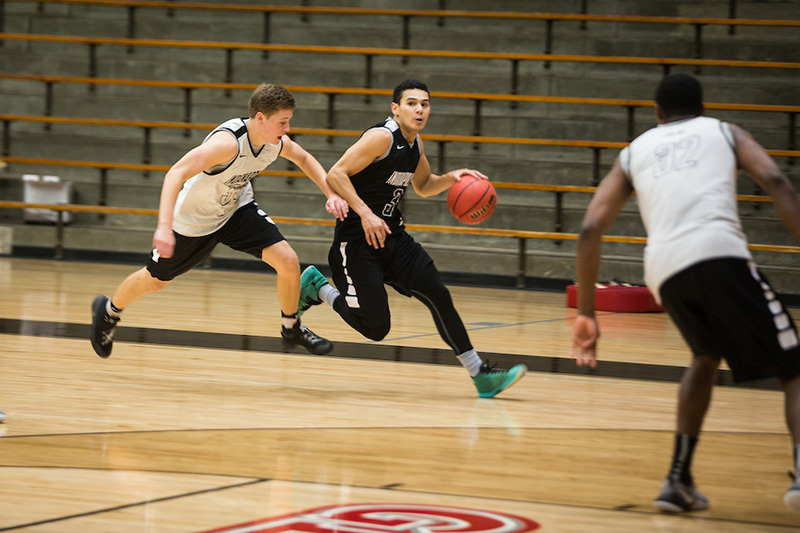 men playing basketball