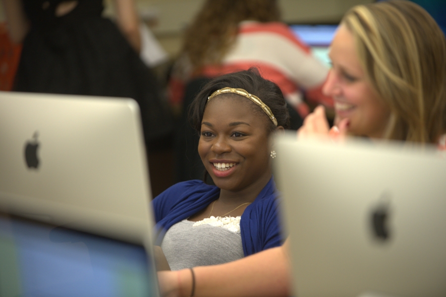 students smiling in class