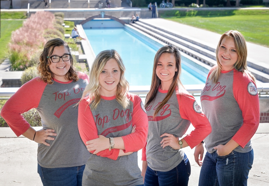 students wearing Top Dog Communications shirts