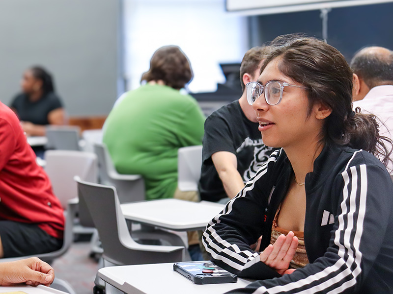 students having a discussion in class