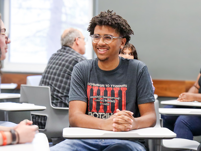 student smiling in class