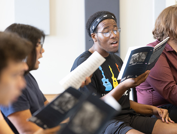 students singing in music class