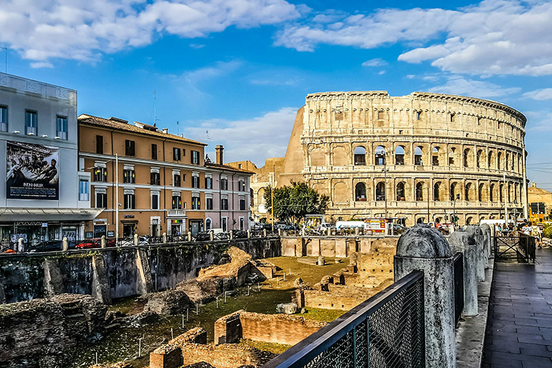 streets of Rome with large building structure (Colosseum)