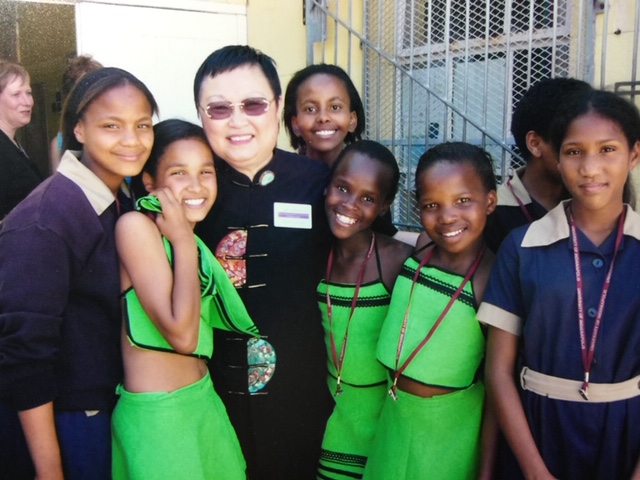 Dr. Lin with kids in South Africa