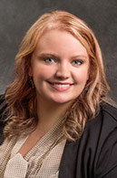 Coran Sigman headshot