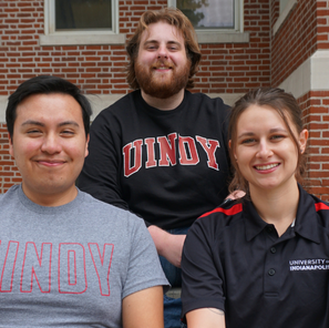 three UIndy students sitting together