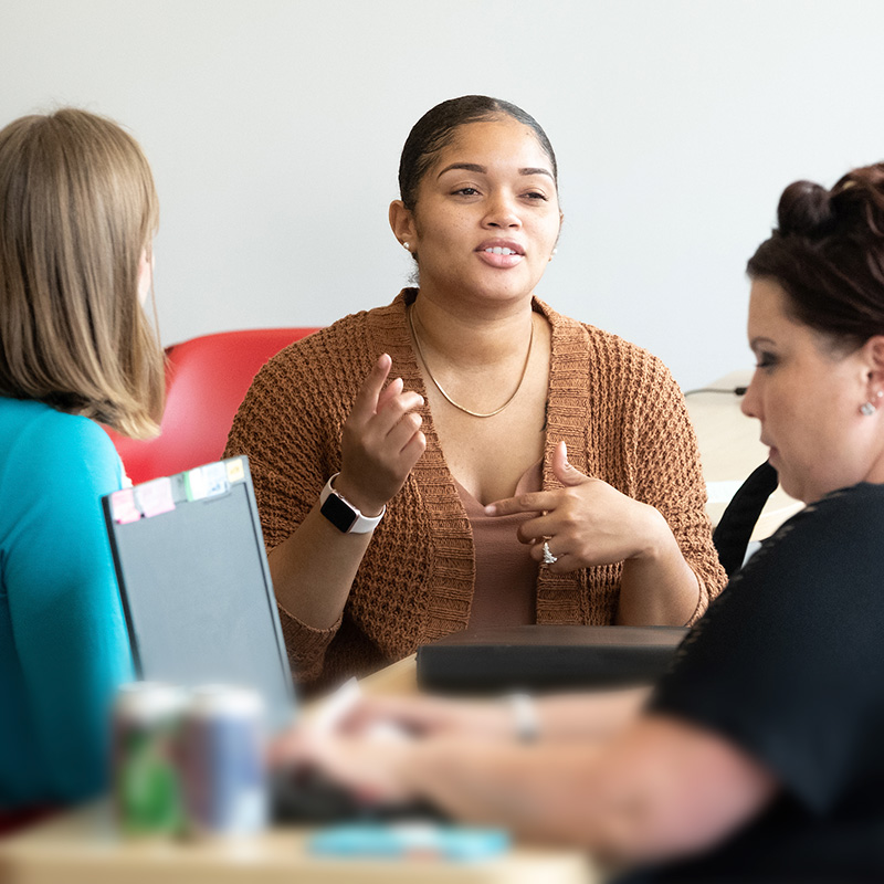 women conversing together