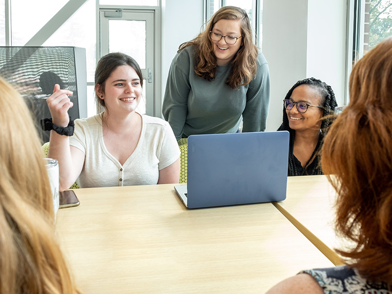 young health students converse in a group setting