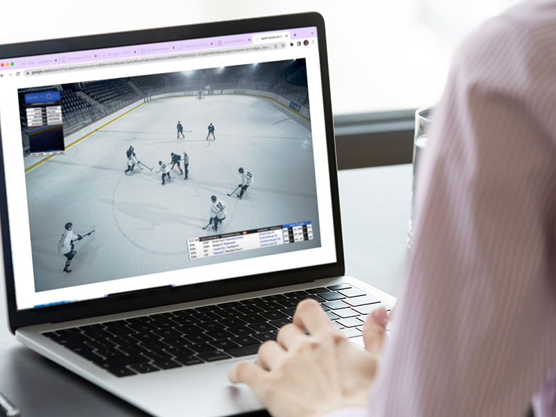 laptop displaying a hockey game