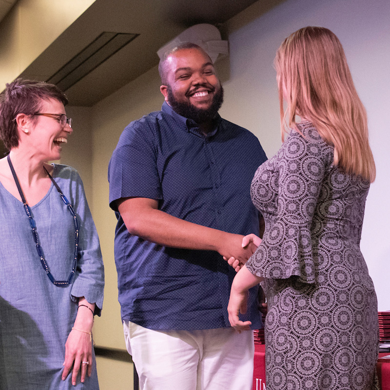 man receiving an award