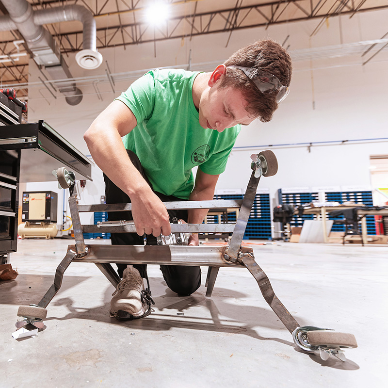 student working on an engineering project