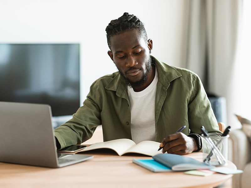 man working on laptop